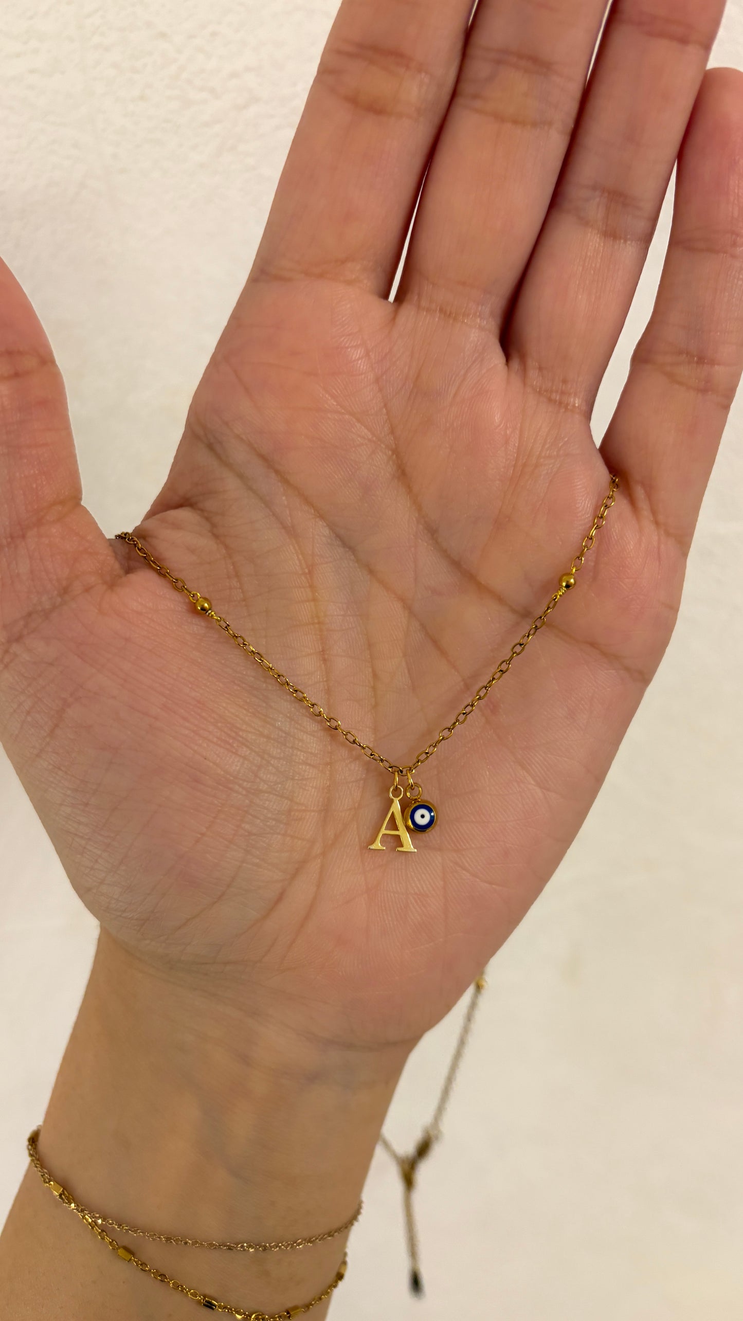 Beaded initial choker necklace with evil eye charm 🤍