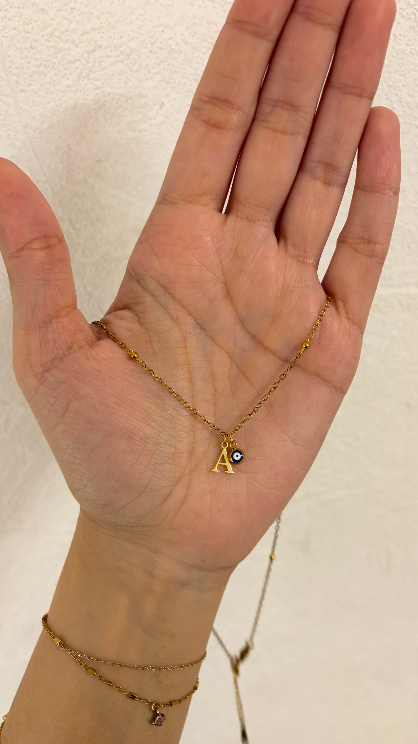 Beaded initial choker necklace with evil eye charm 🤍
