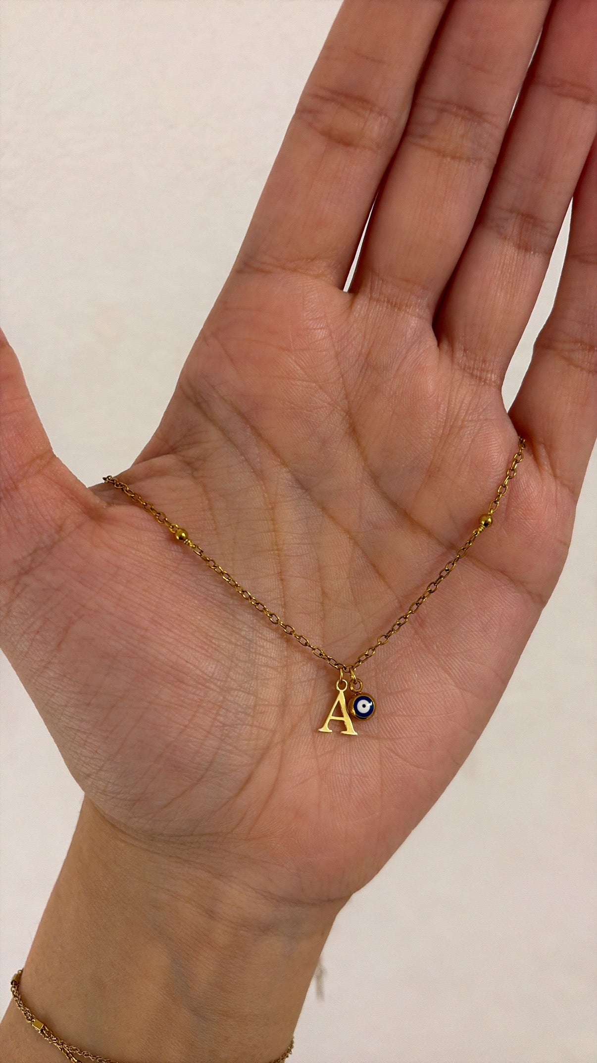 Beaded initial choker necklace with evil eye charm 🤍